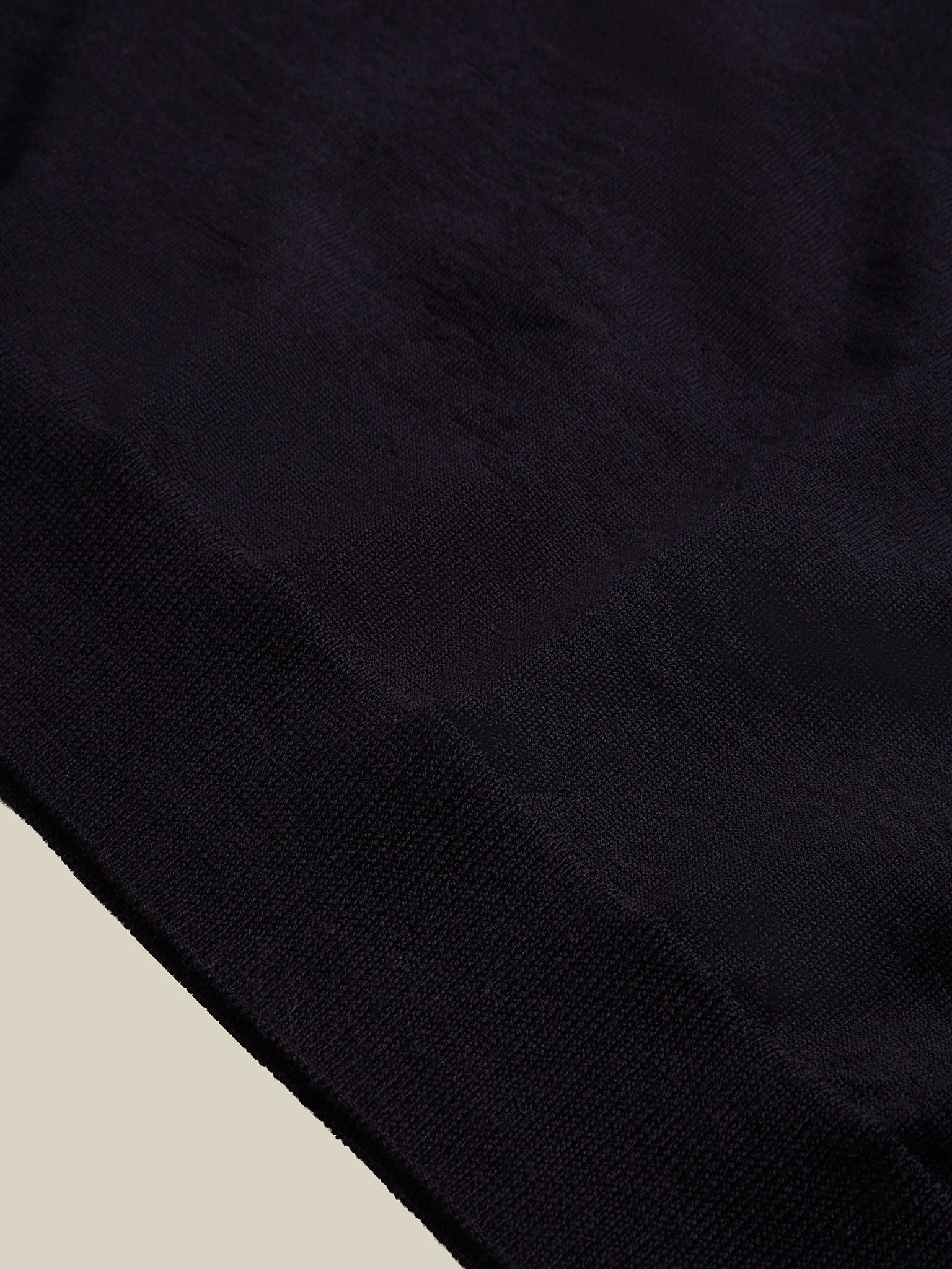 our blue merino jumper offers both comfort and style.