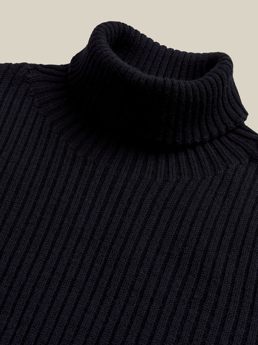 Soft blue knit jumper with roll neck