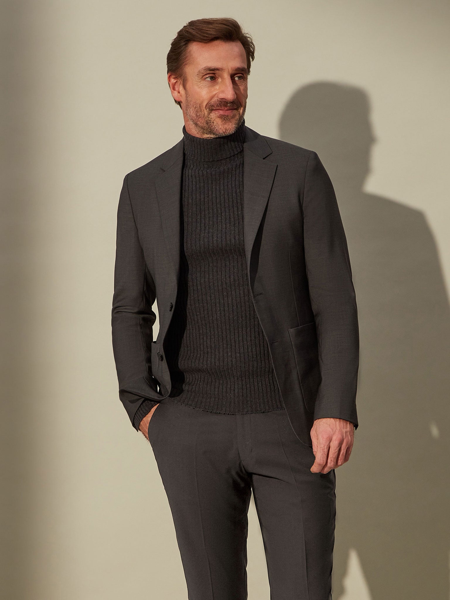 grey roll neck sweater -  perfect for smart and comfortable travel attire