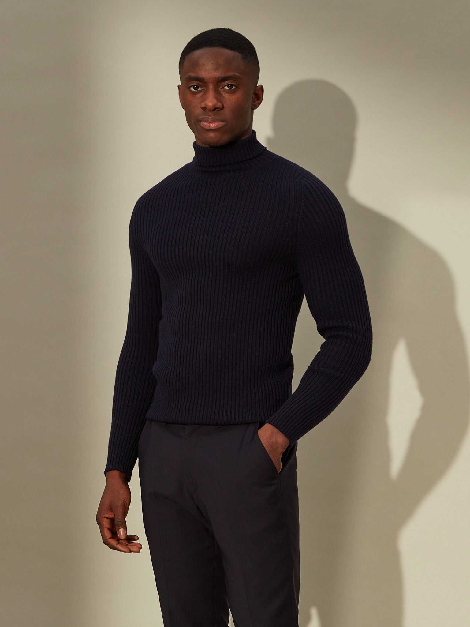 Blue wool blend sweater with rolled neck