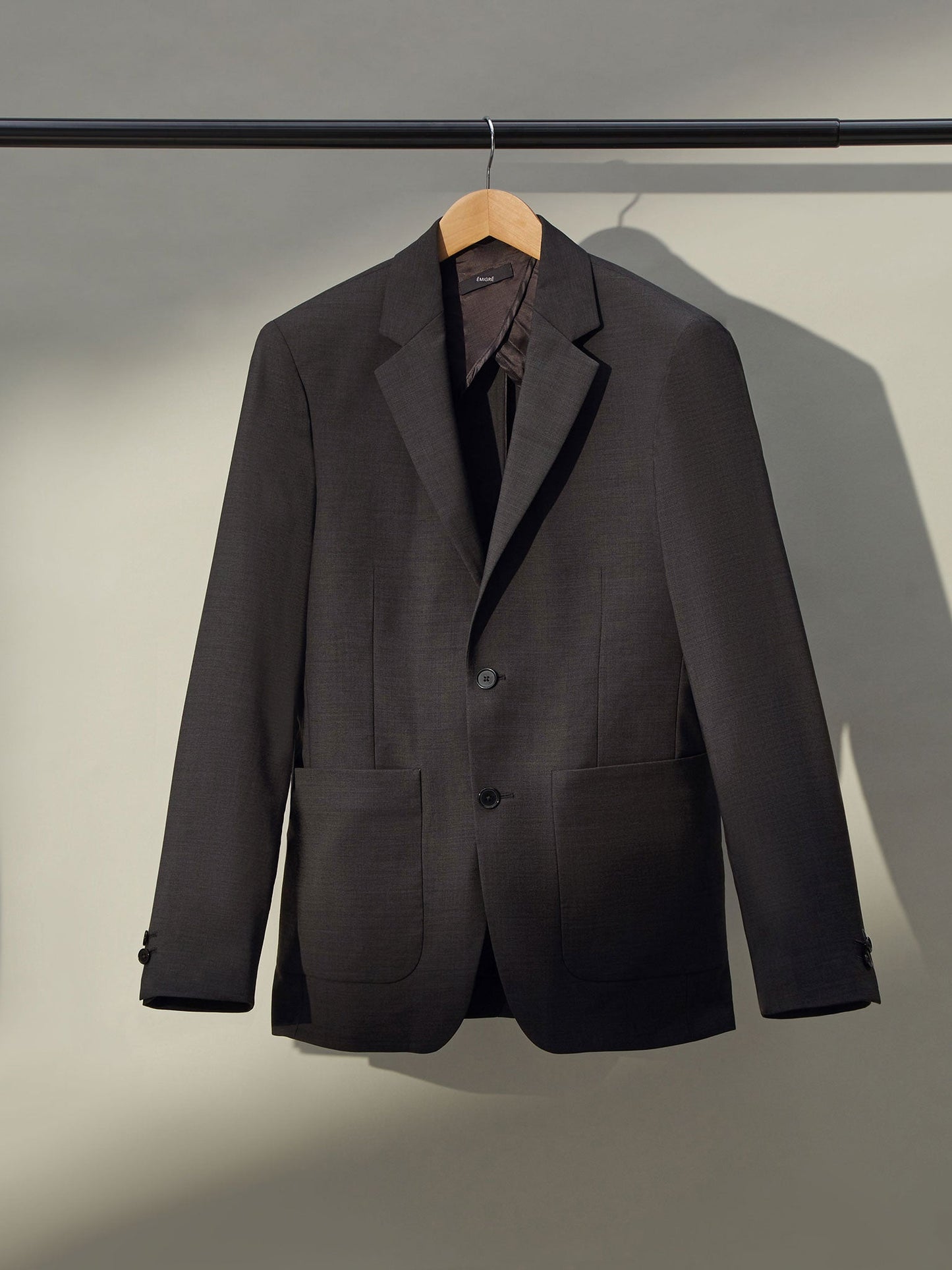 Sleek and modern men's grey blazer with notched lapels and two-button closure
