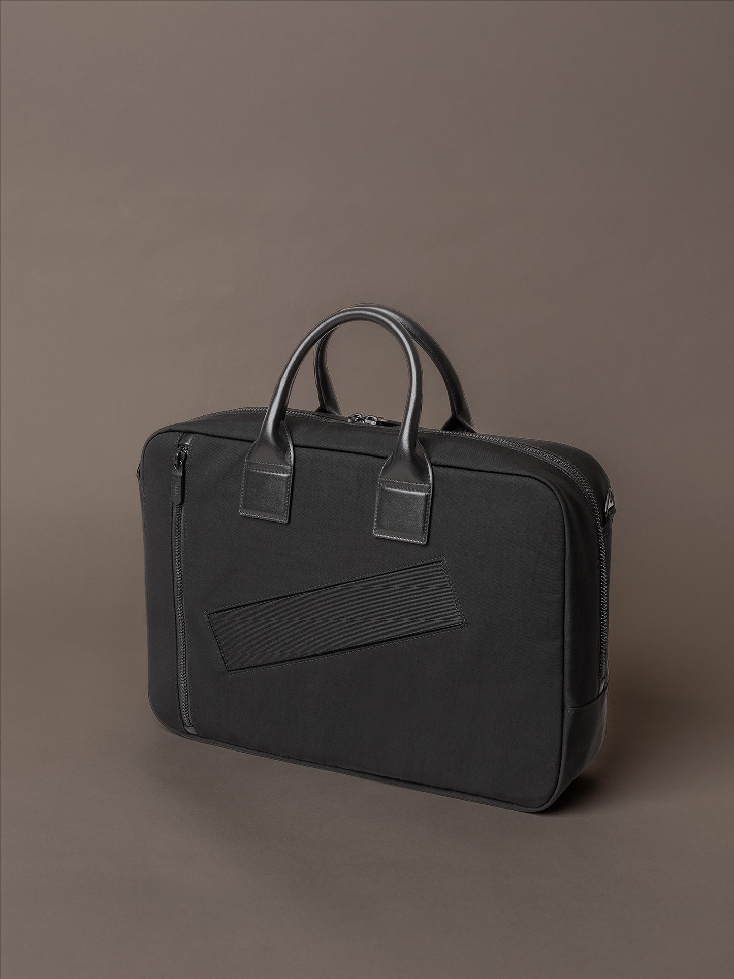 Mens briefcase featuring high-quality hardware and secure zip closure for everyday use