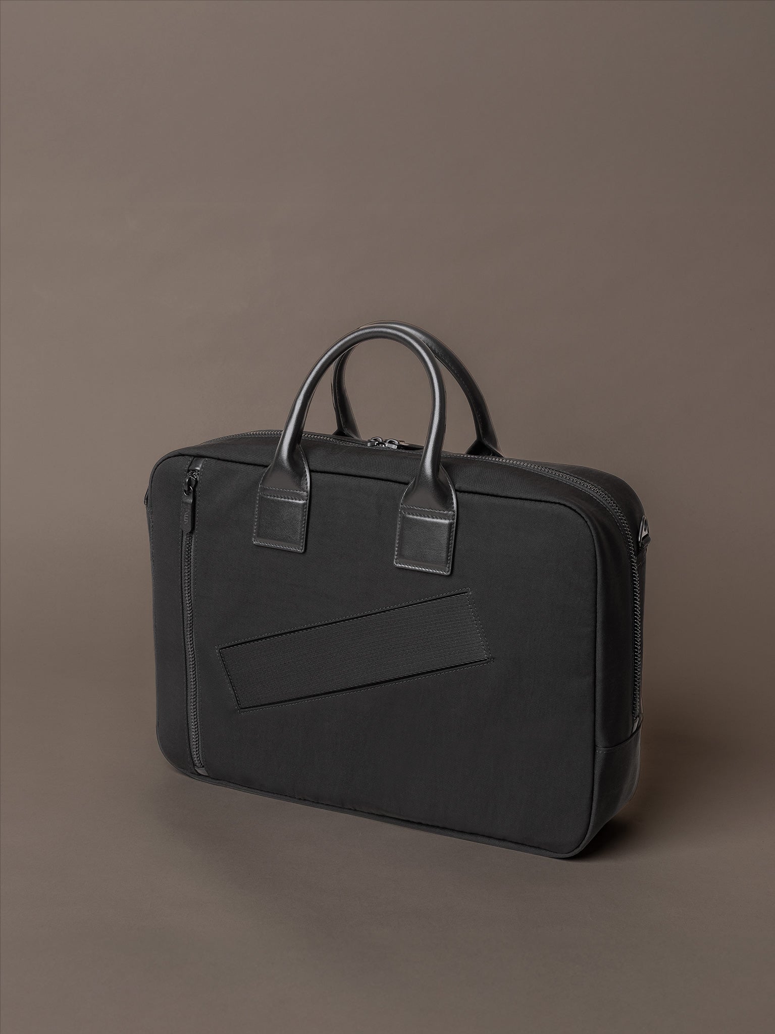 Mens briefcase featuring high-quality hardware and secure zip closure for everyday use