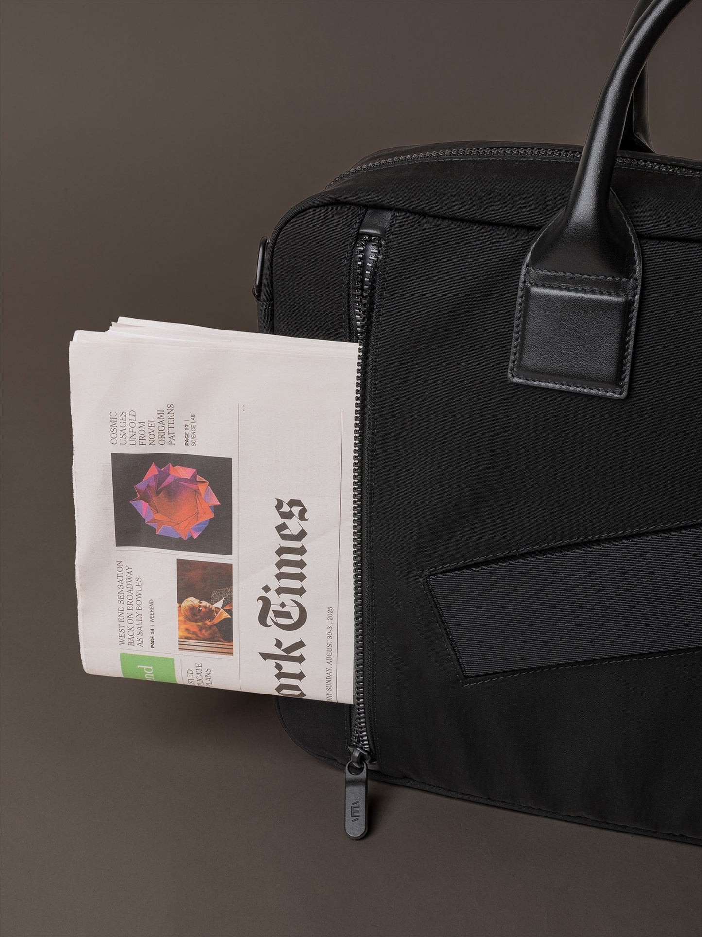 Mens briefcase with discreet back pocket for secure storage of valuables