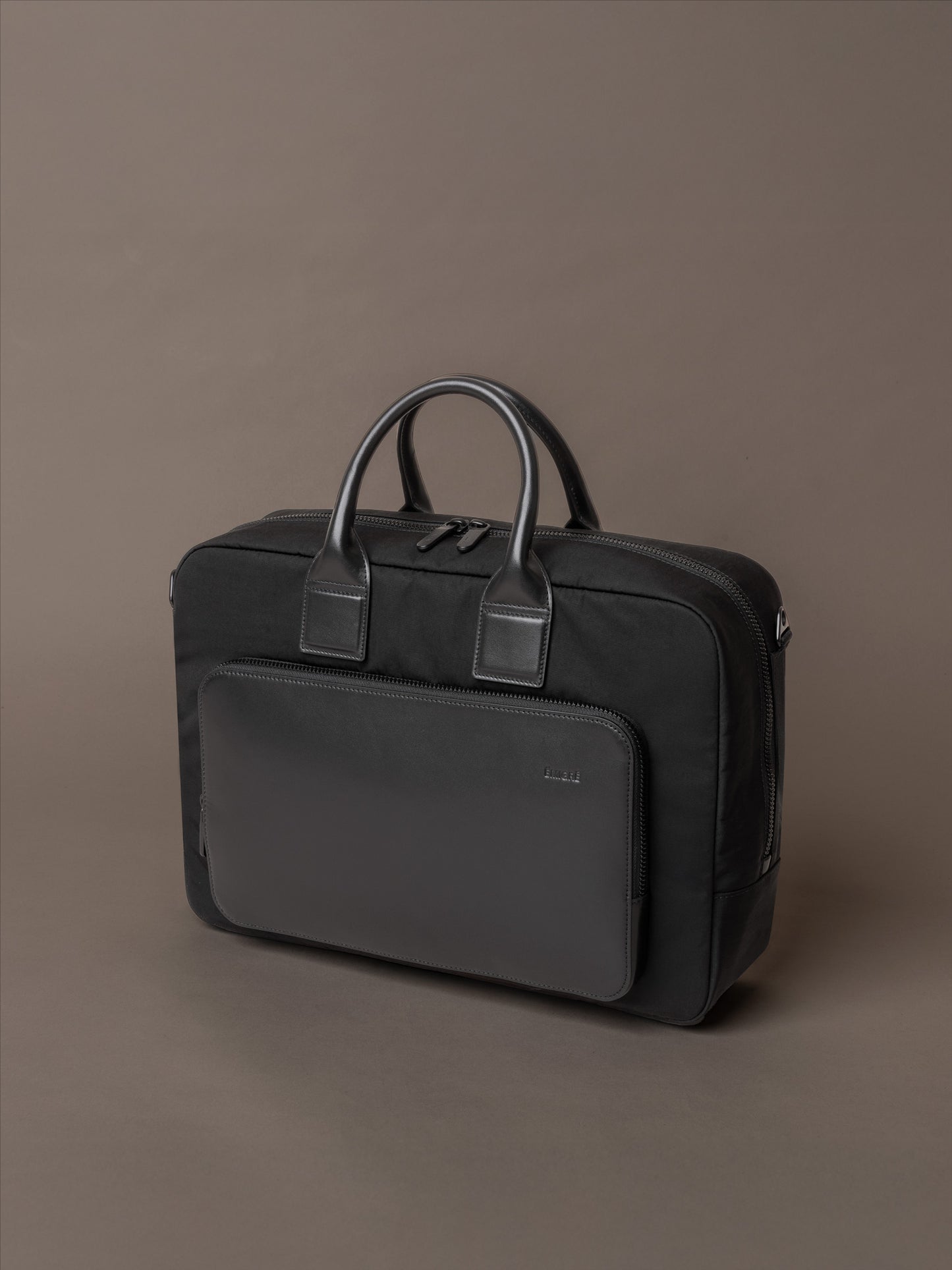 Mens briefcase in structured design with clean lines, premium materials and minimal detailing
