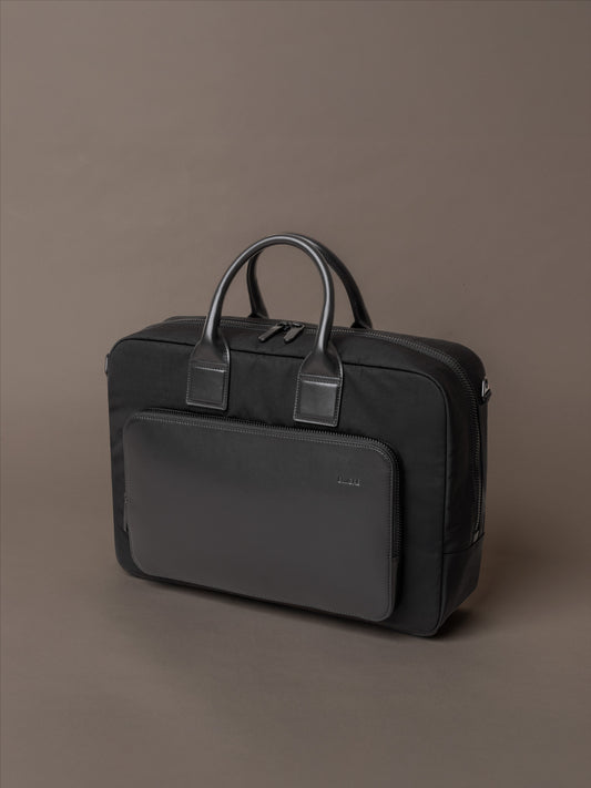 Mens briefcase in structured design with clean lines, premium materials and minimal detailing
