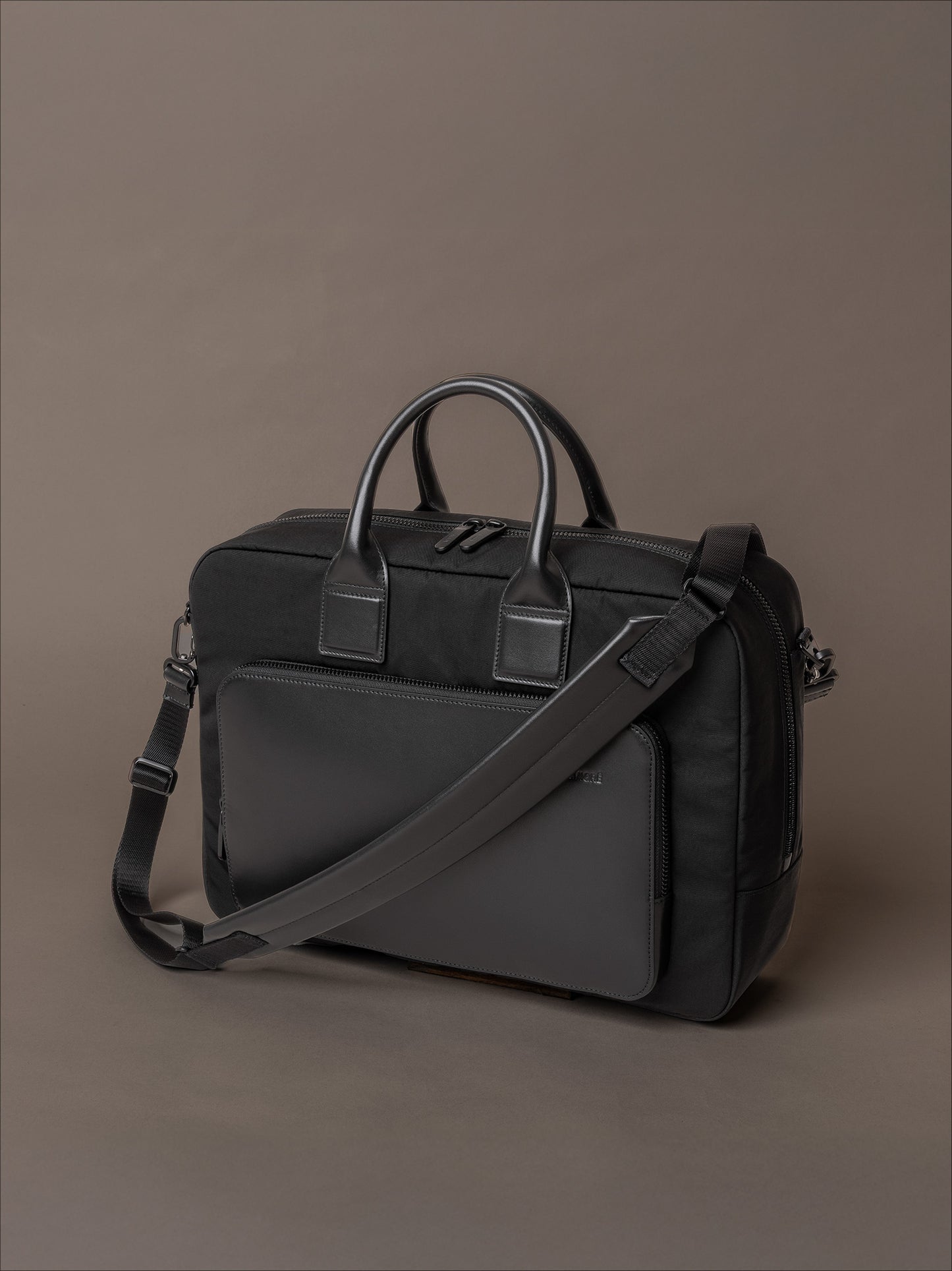 Briefcase for men with reinforced handles and adjustable shoulder strap for versatile carry