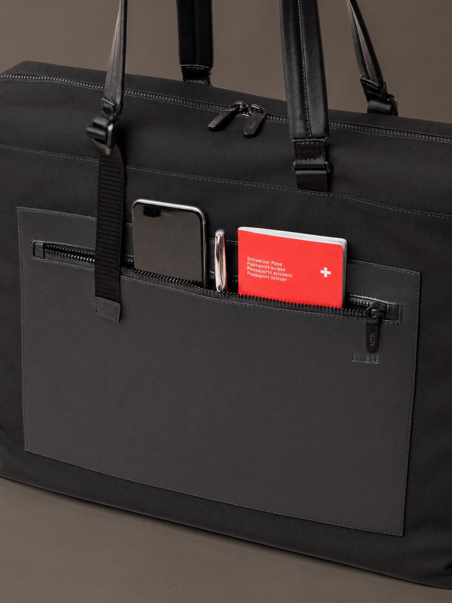Leather front pocket for quick access to everyday essentials