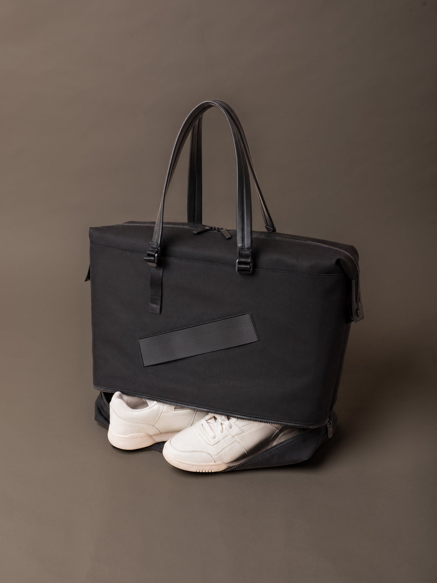 Tote bag interior with organised storage for laptop, documents and daily essentials