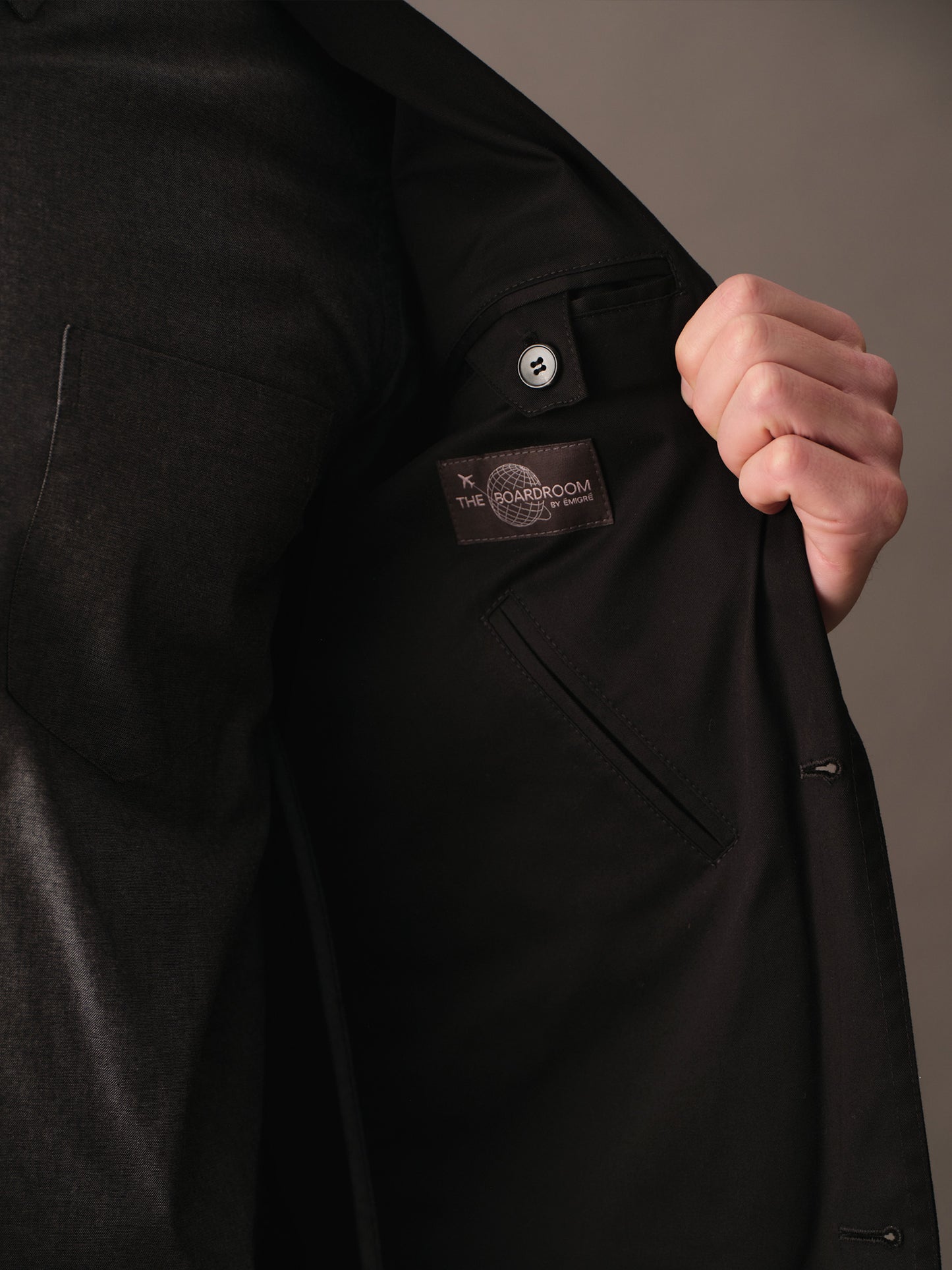 Interior pocket and label detailing inside the men’s cotton blazer