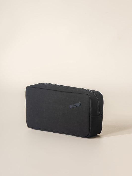 A black tech pouch with zipper closure
