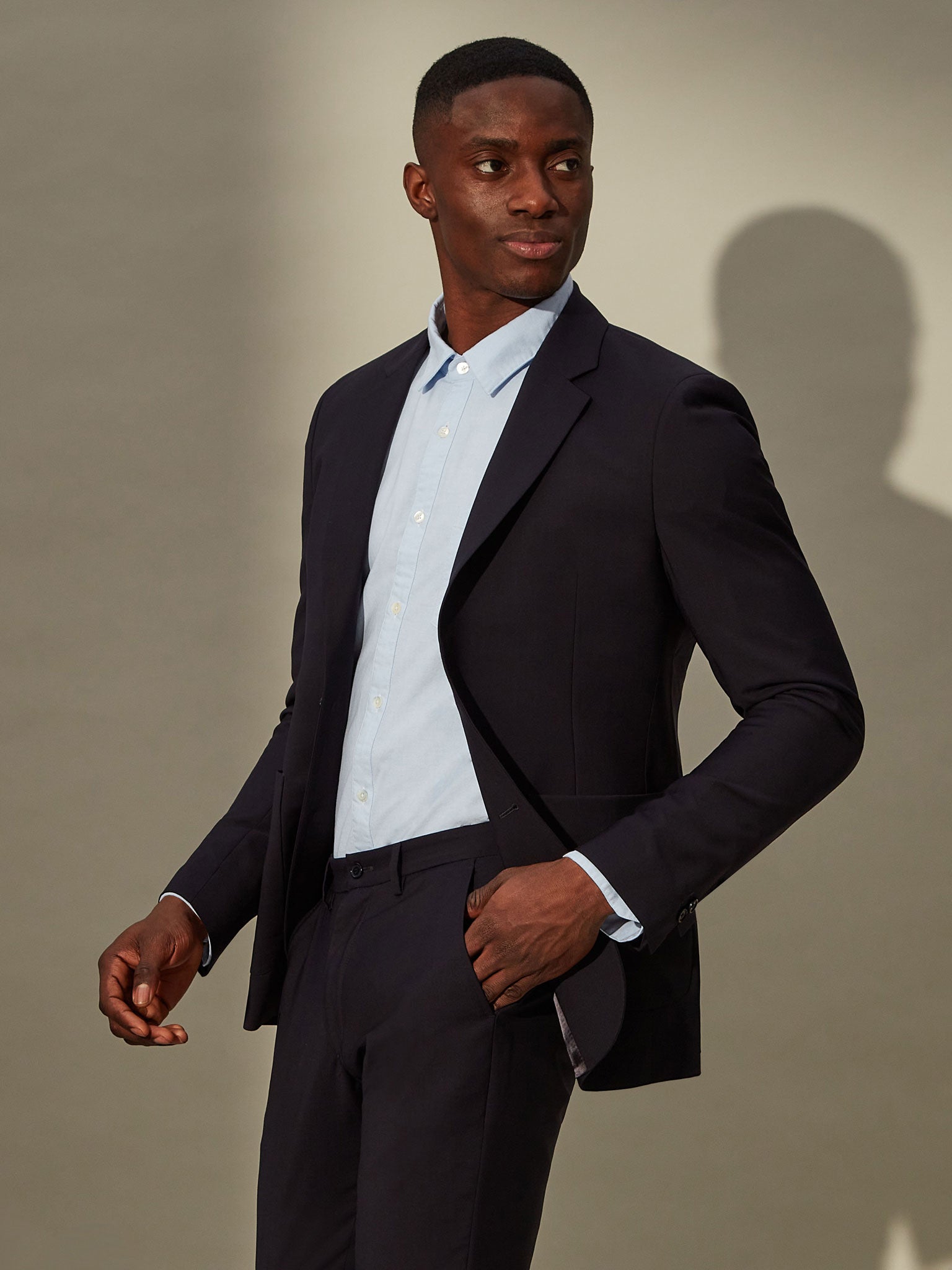 Classic men's blue blazer with single-breasted design and flap pockets