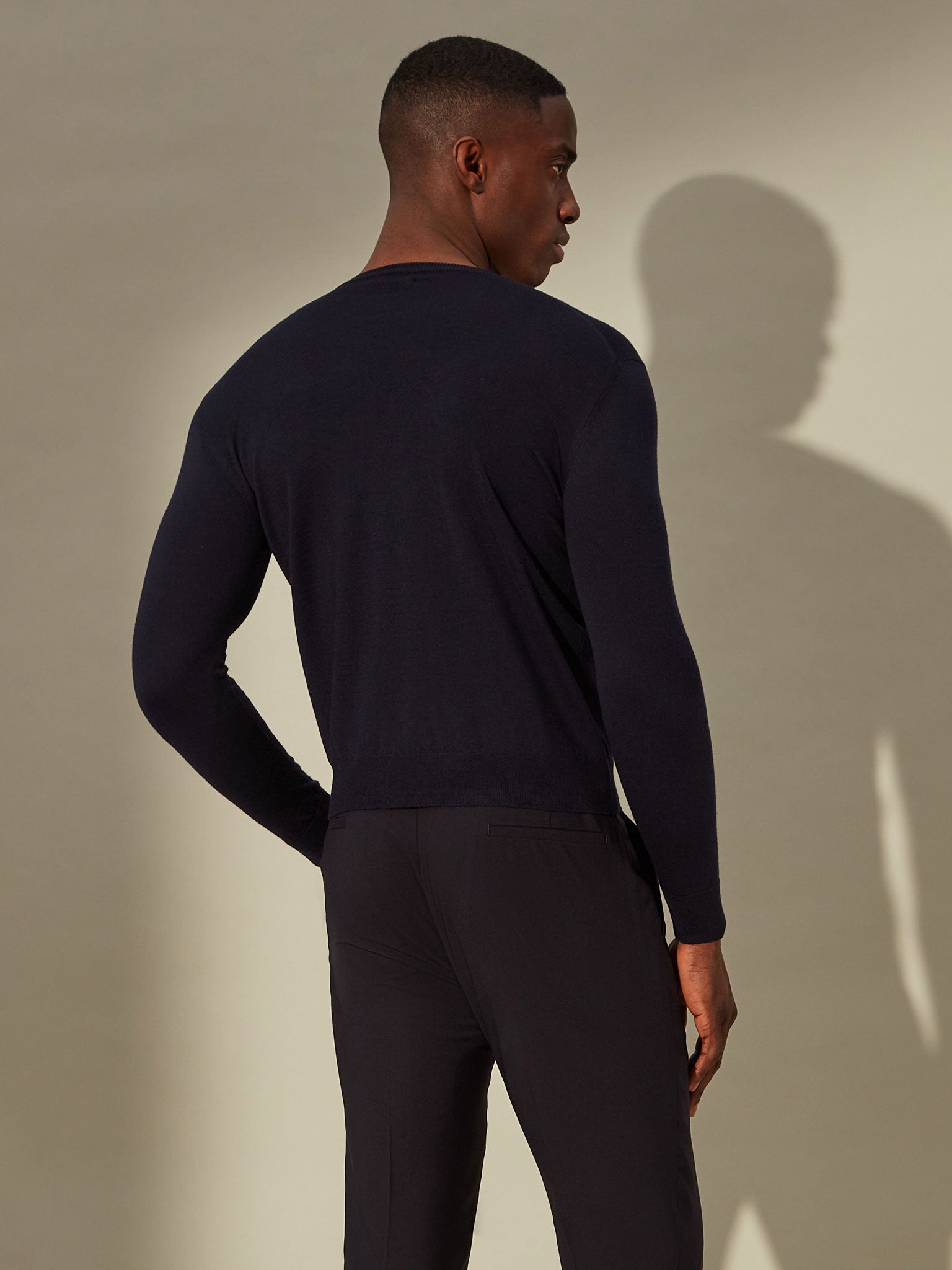 blue merino jumper, perfect for leisure or travel. 