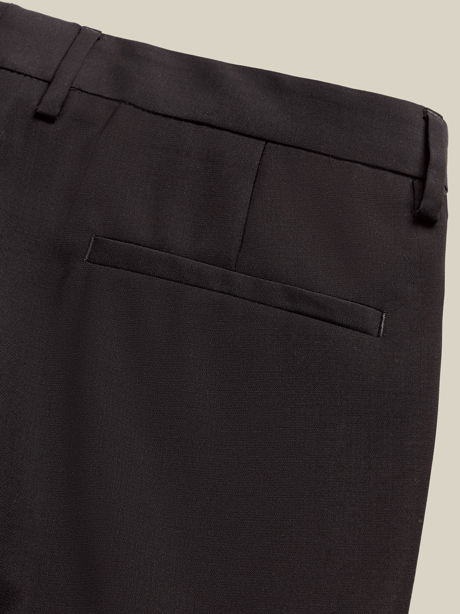 Comfortable men's grey wool trousers with stretch waistband and wrinkle-resistant fabric