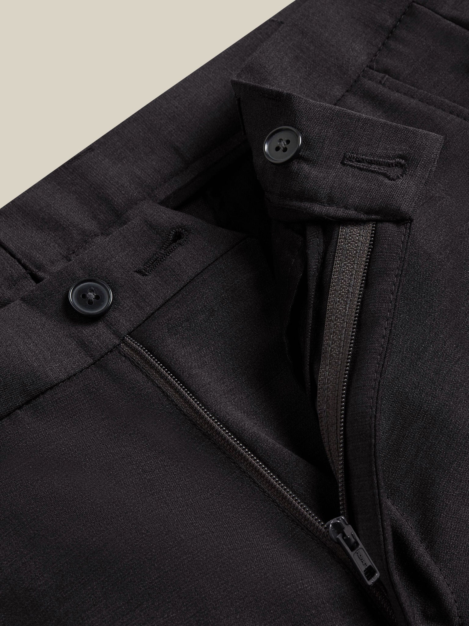 Travel-friendly men's grey wool trousers with easy-care
