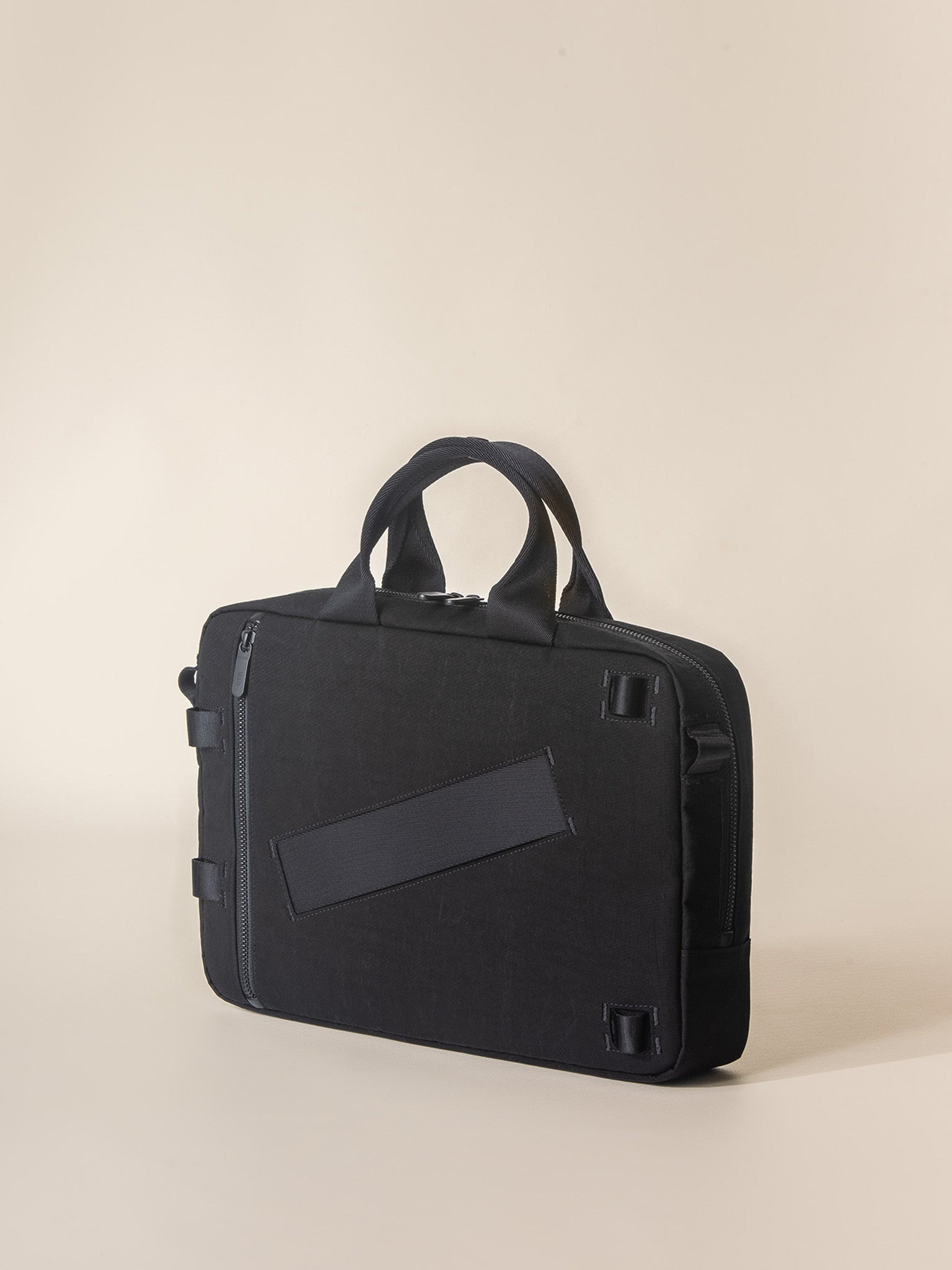 A sleek black briefcase for men with multiple compartments for organizing documents and other essentials