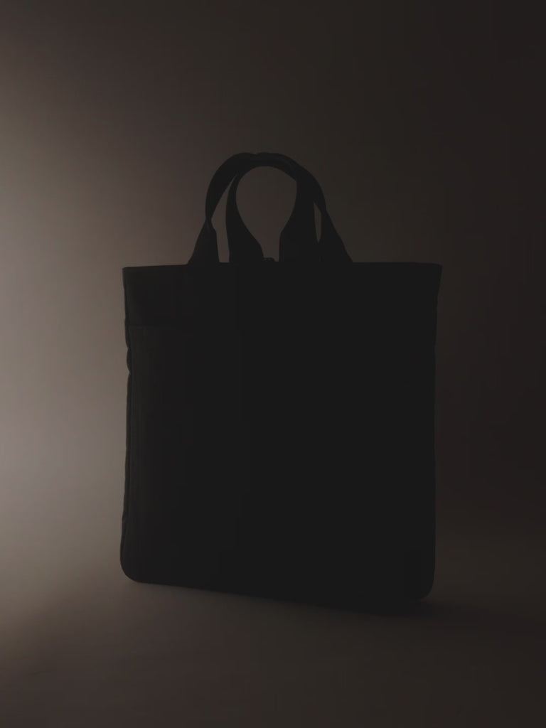 A stylish business tote bag with a spacious main compartment for essentials